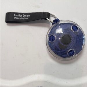 Skin Compact Foldable Shopping Bag with Orange Accent and Clear Case